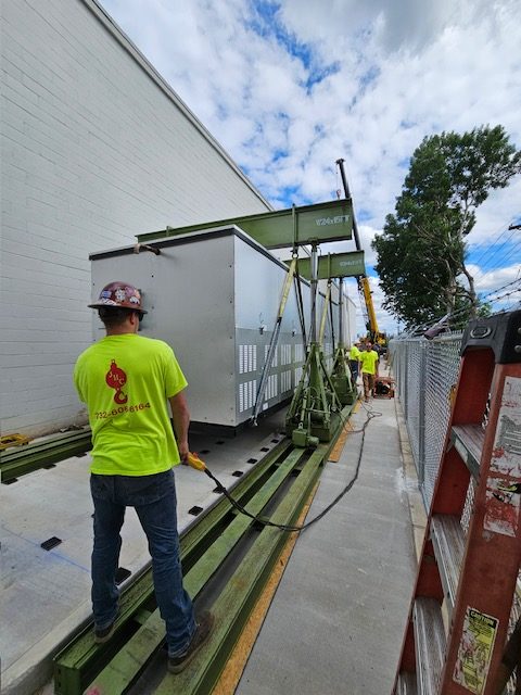 Jobsite picture featuring LGH hydraulic gantries and track from case study with J Haugh Cranes.