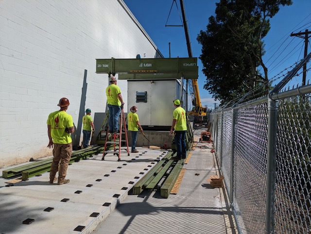 Jobsite picture featuring LGH hydraulic gantries and track from case study with J Haugh Cranes.
