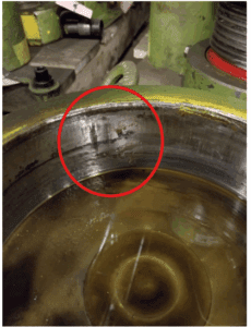 Image of a hydraulic lock nut ram, showing damage from improper use.