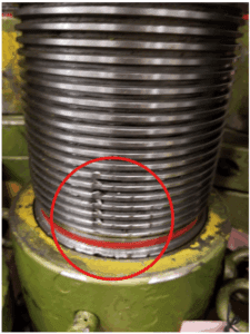 Image of a hydraulic lock nut ram, showing damage from improper use.