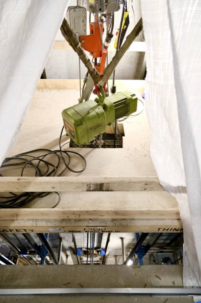 An electric chain hoist from LGH in an elevator shaft.