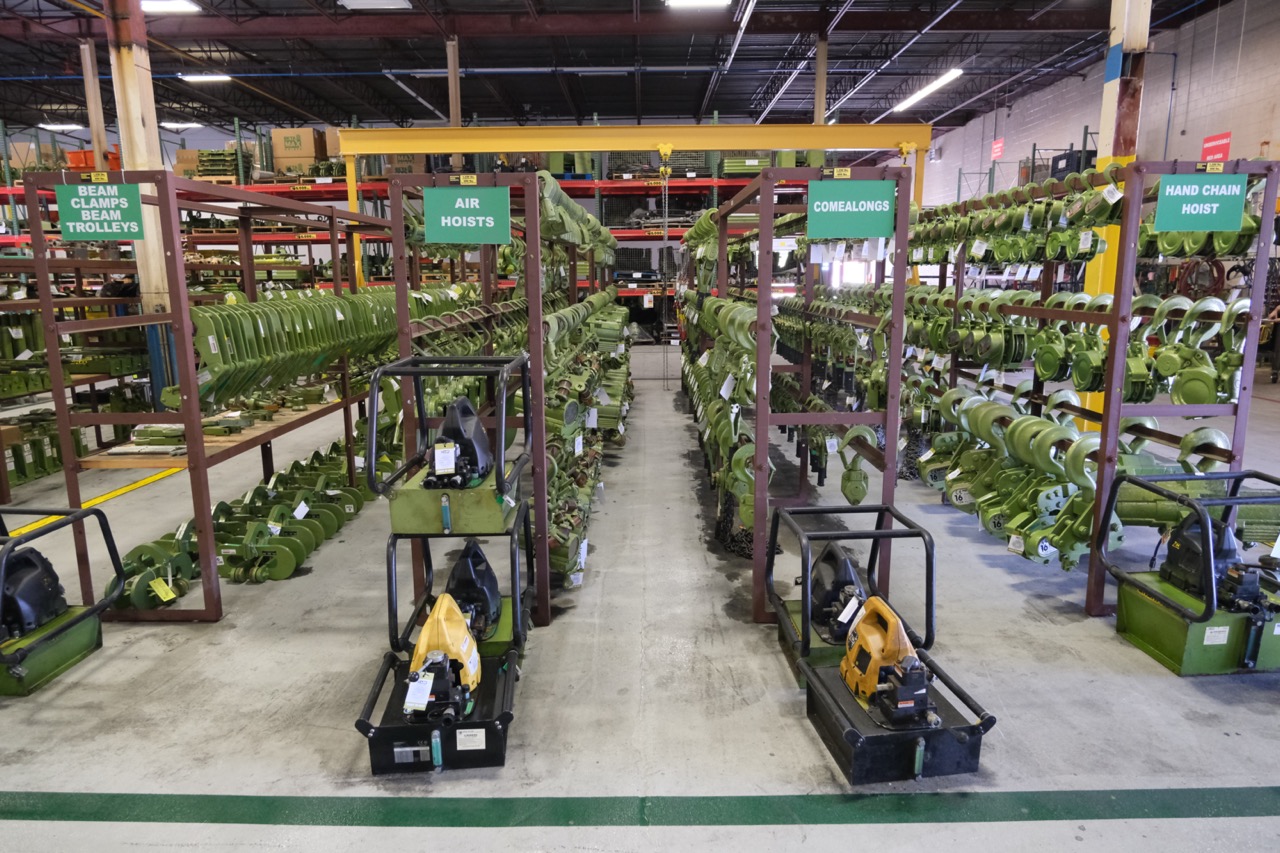 A photo inside our Oakville Ontario LGH Canada warehouse, showcasing our meticulously maintained chain hoists, beam clamps, beam trolleys and more