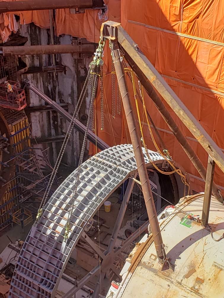 A tunnel boring machine being lifted with rigging and lifting equipment from LGH.
