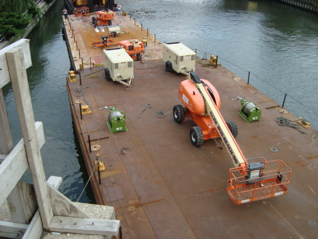LGH air powered winches on a barge in the Chicago river. These winches helped modernize the famous congress parkway bridge.