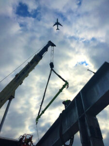 Infrastructure and transport industry construction of CTA Wilson station in Chicago with a spreader beam