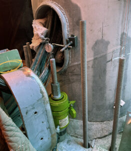 Monopole reinforcement project pull testing with hydraulic ram Swift Underground