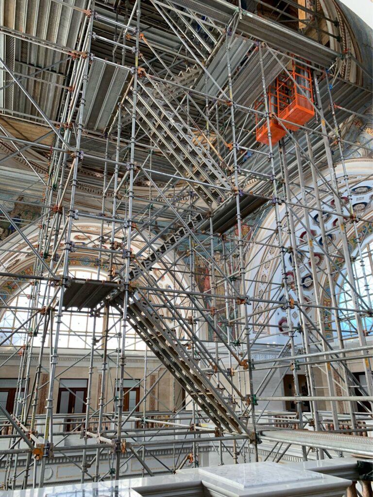 The Beta Max Maxial Track Hoist electric scaffolding hoist system, being used inside the US Capitol building for restoration.