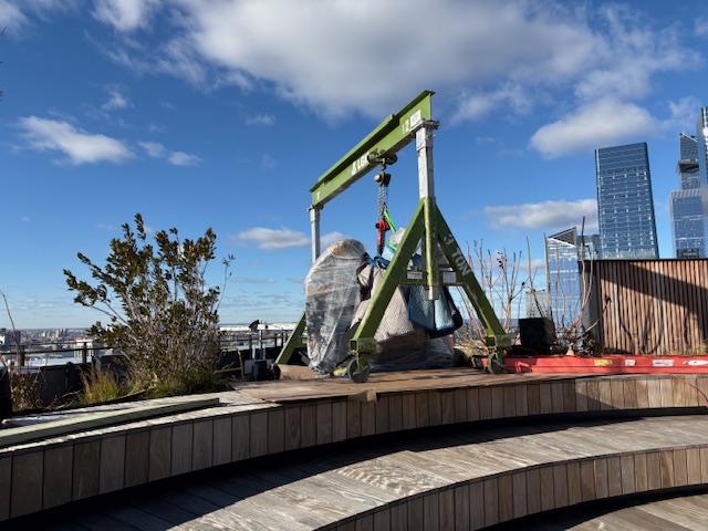 Sculpture installation with gantry crane